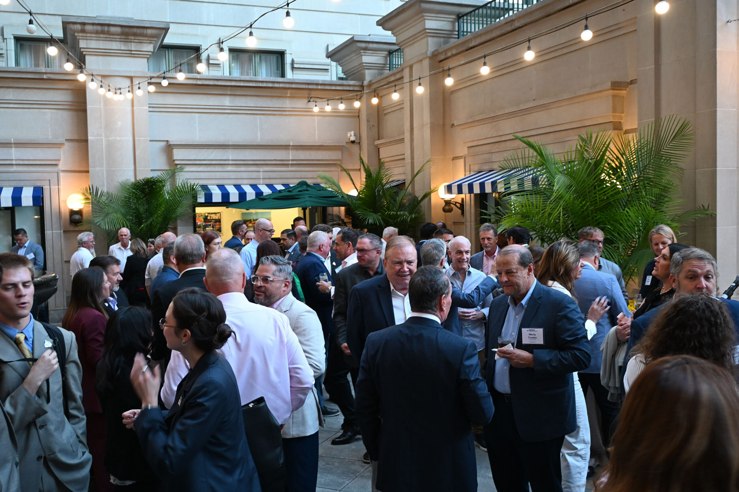 Attendees talking at a 2026 National Policy Conference reception