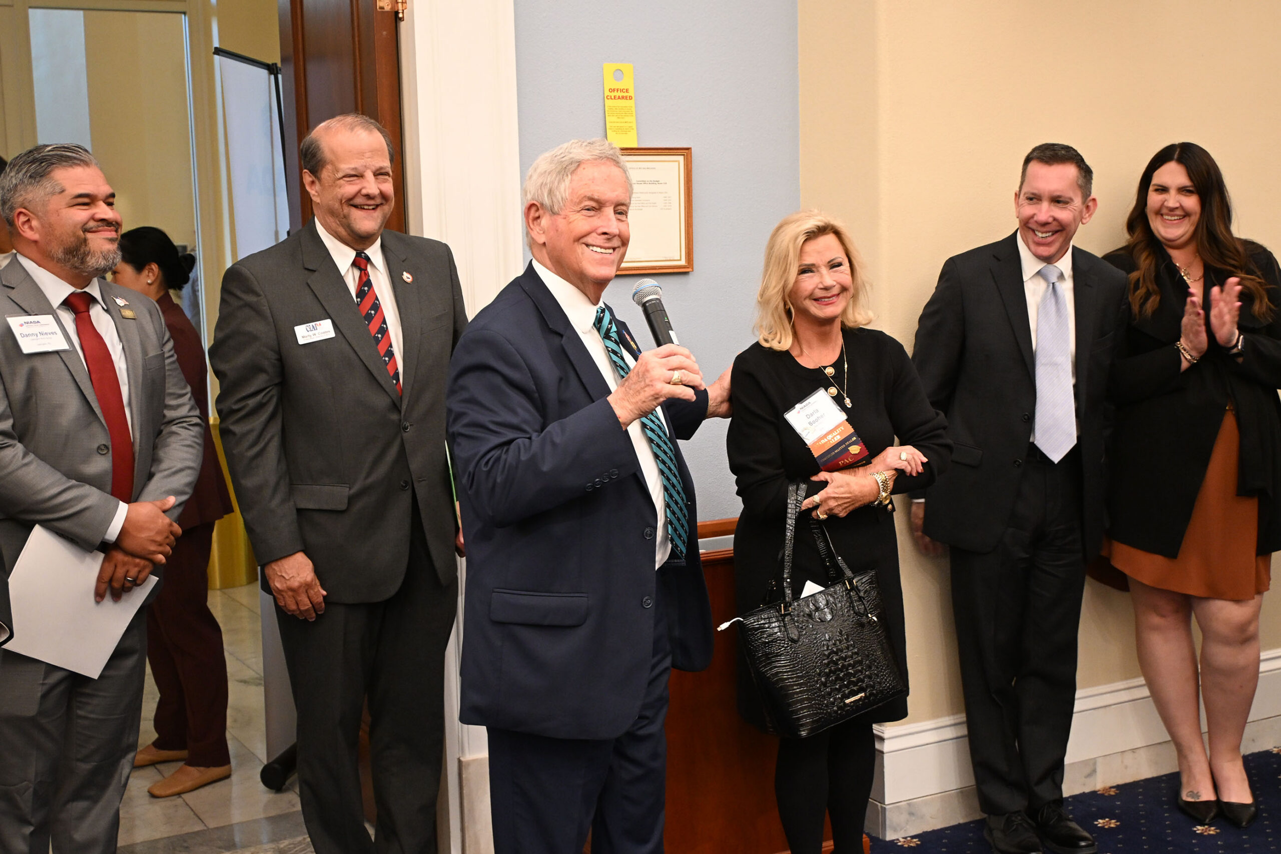 A senator with dealers and industry partners at the 2026 National Policy Conference